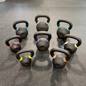 Strength Training Equipment- 8 Kettlebells of various weights (6KG-28KG) arranged in the shape of a heptagon