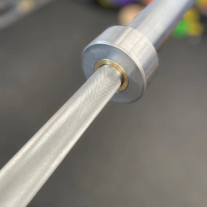 Strength Training Equipment- (300*300)- Cropped profile view of the 220CM 20KG Commercial Standard Olympic Bar with view of the knurling and sleeve area