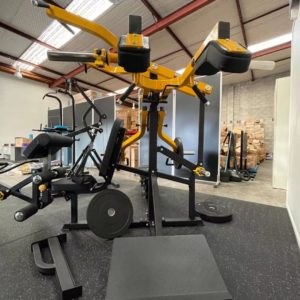 Strength Training Equipment- Front view of the three person station gym machine