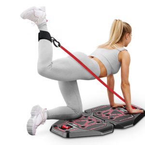 Strength Training Equipment- (300*300)- Rear view of a woman performing a rear leg extension in pushup position using the Fusion Motion Portable Gym