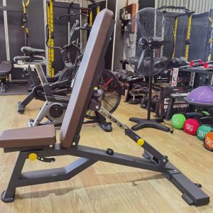 Strength Training Equipment- (300*300)- Profile view of the Flat/Incline Weight Bench in a gym setting