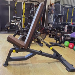 Strength Training Equipment- (300*300)- Side view of the Flat/Incline Weight Bench in a gym setting