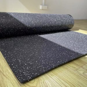 Gym Accessories- (300*300)- Side Profile view of a partially unrolled Black Flooring Mat (7000MM*1000MM*5MM)