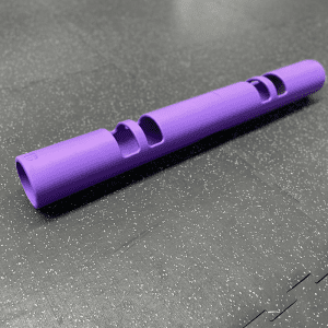 Gym Equipment- (300*300)- Profile view of the 4KG Purple Colour VIPR Natural Rubber Weight Fitness Barrel on gym floor