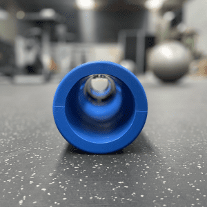 Gym Equipment- (300*300)- Side view of the 8KG Blue Colour VIPR Natural Rubber Weight Fitness Barrel on gym floor