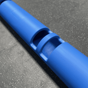 Gym Equipment- (300*300)- Close view of the handle area of the 8KG Blue Colour VIPR Natural Rubber Weight Fitness Barrel on gym floor