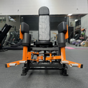 Strength Training Equipment- (300*300)- Low angle front View of the Hip Abduction Trainer Gym Machine in gym setting