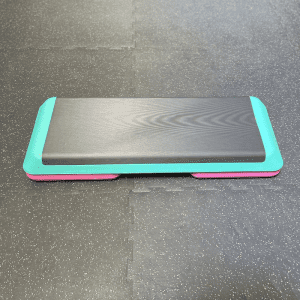 Cardio Equipment- (300*300)- Adjustable Aerobic Studio Stepper (Black/Green/Pink) (1 Level attached) on gym floor