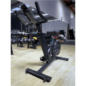 Exercise Bike Trainer- (300*300)- Low-Angle front Profile view of the Smart Spin Bike in gym setting