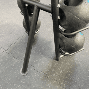 Bottom view of medicine ball stand with balls in gym
