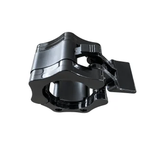 Angled close-up of a black barbell collar with its lever open and inner gripping surface visible.