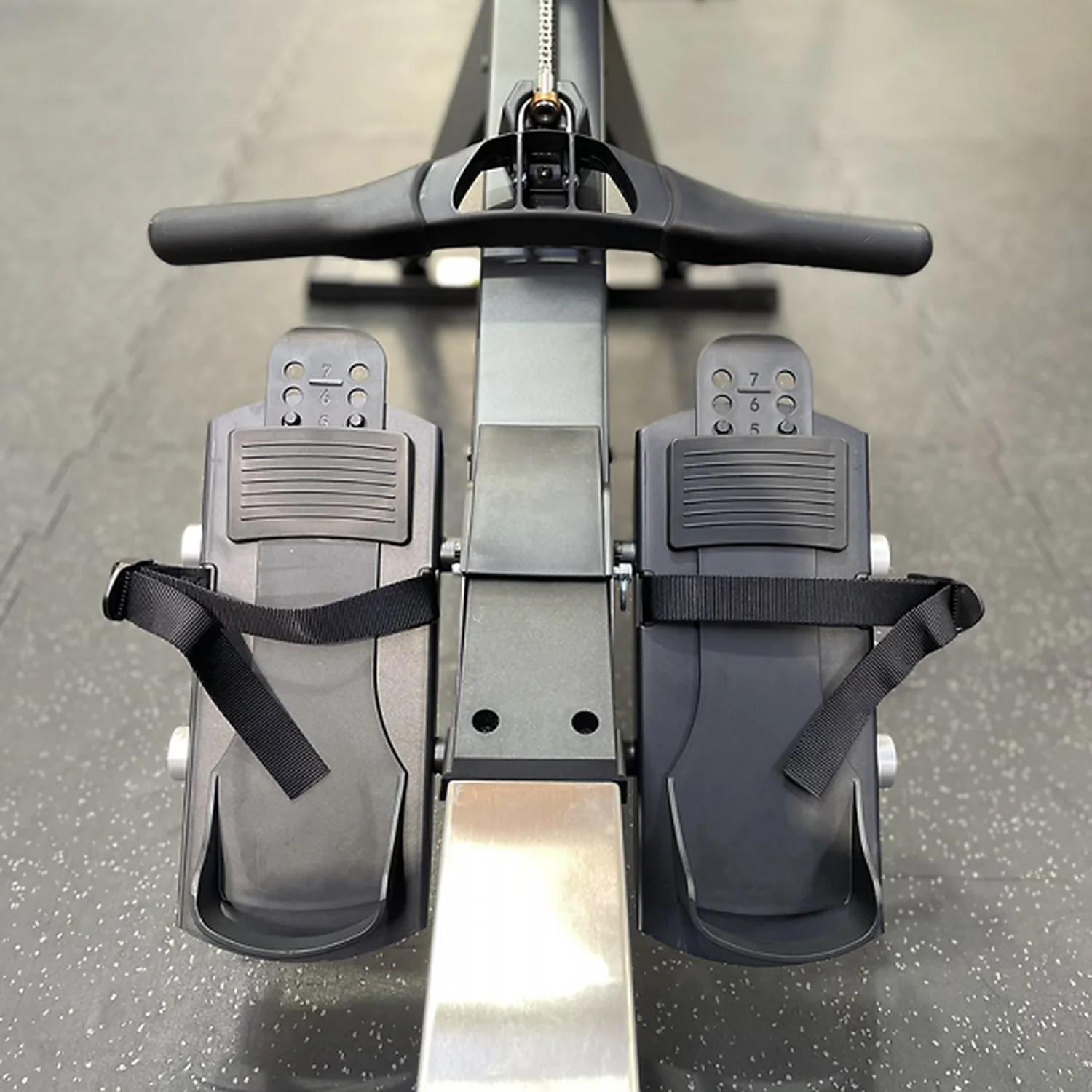 DB Fitness air rower adjustable footrests with straps and ergonomic rowing handle