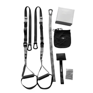 DB Fitness suspension trainer kit with adjustable straps, handles, door anchor, storage bag and accessories on a white background