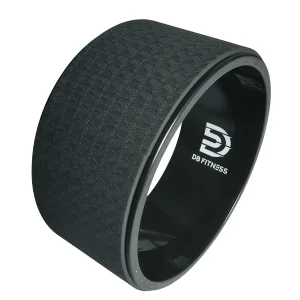 DB Fitness yoga wheel angled view showing textured non-slip outer surface and supportive inner ring for stretching and mobility.