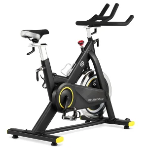 DB Fitness DB-3101 Core spin bike three-quarter view with black frame, yellow accents and adjustable racing handlebars on a white background