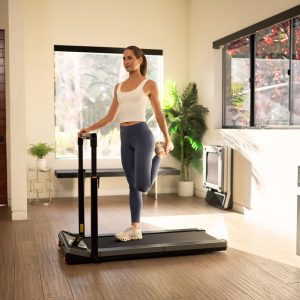 DB Fitness walking pad: A woman in activewear demonstrates a healthy lifestyle with this compact and convenient fitness solution.